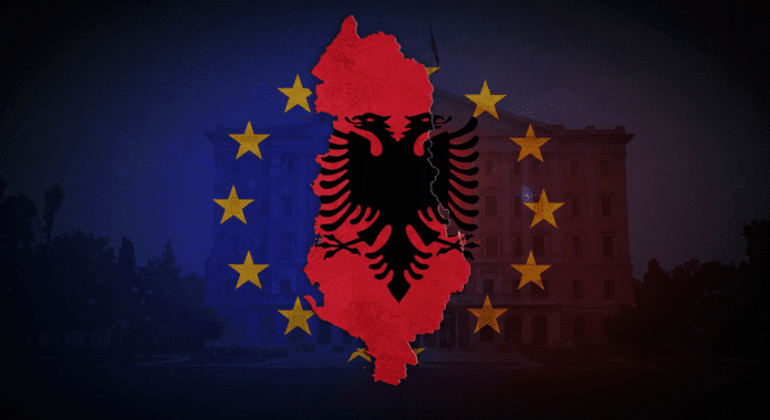 Mappa dell'Albania e bandiera UE con ombre scure a simboleggiare le controversie sull'integrazione europea.